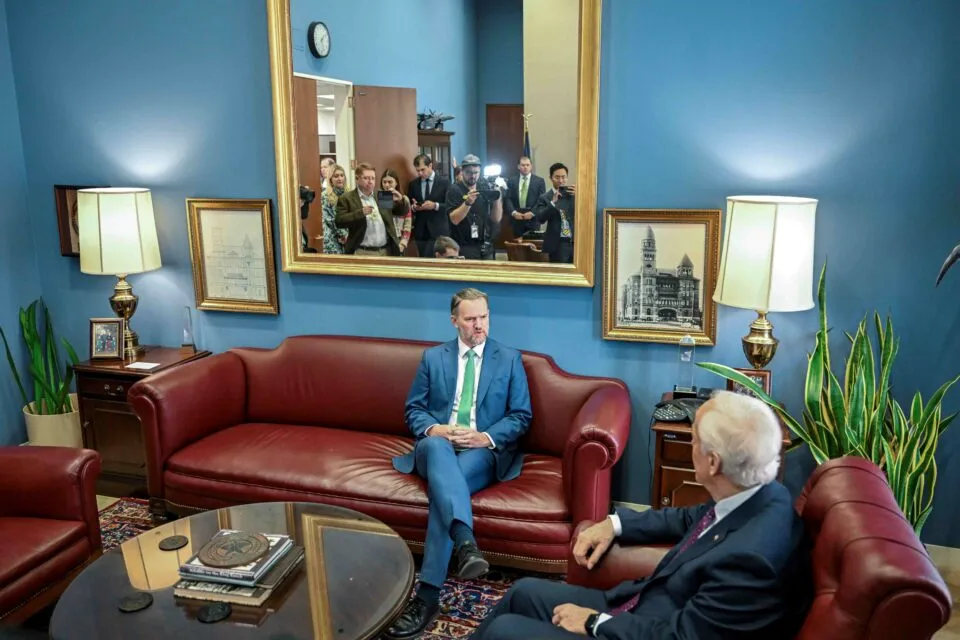 quem é o cérebro da guerra comercial de Trump